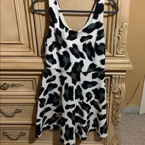 White dress with grey and white print.